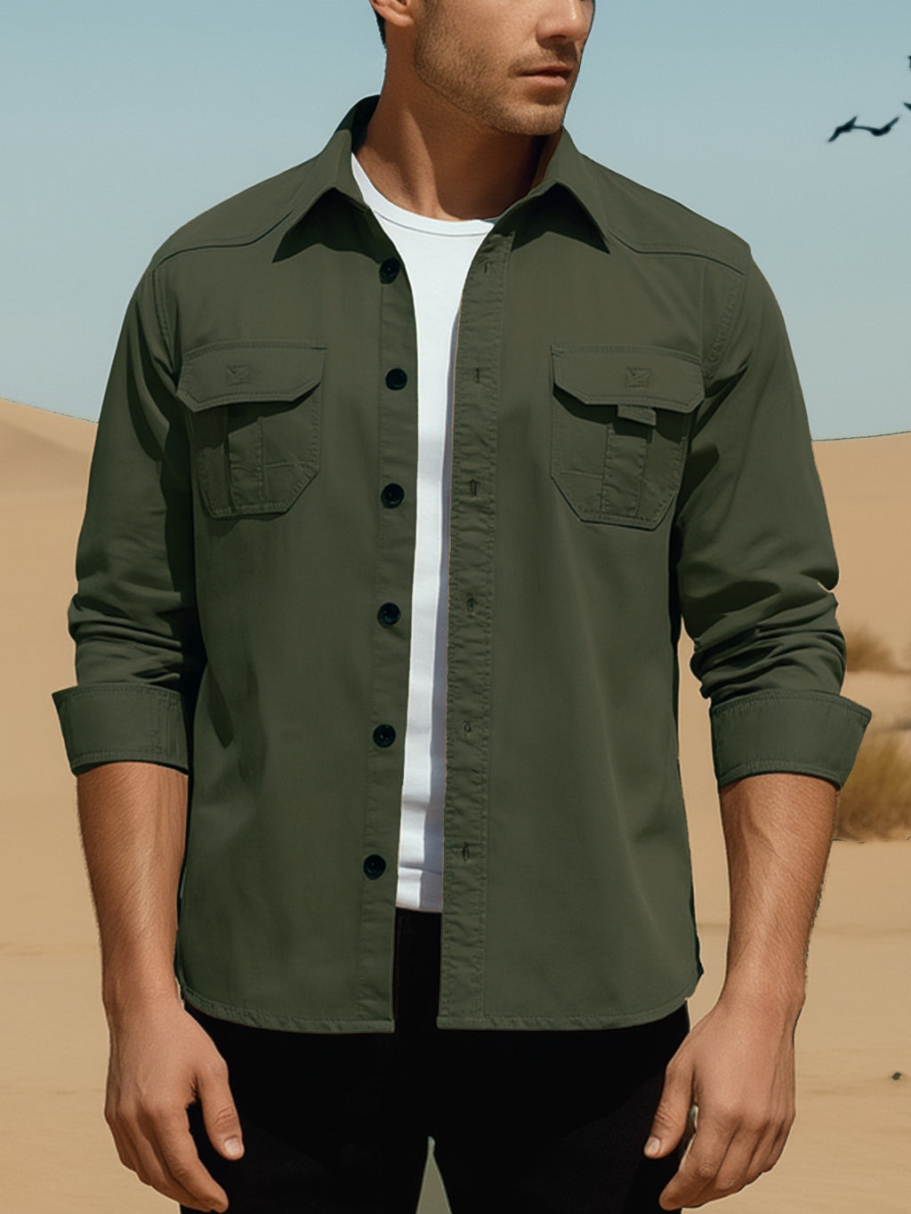Man wearing olive green FREDD MARSHALL high-performance outdoor shirt in desert setting