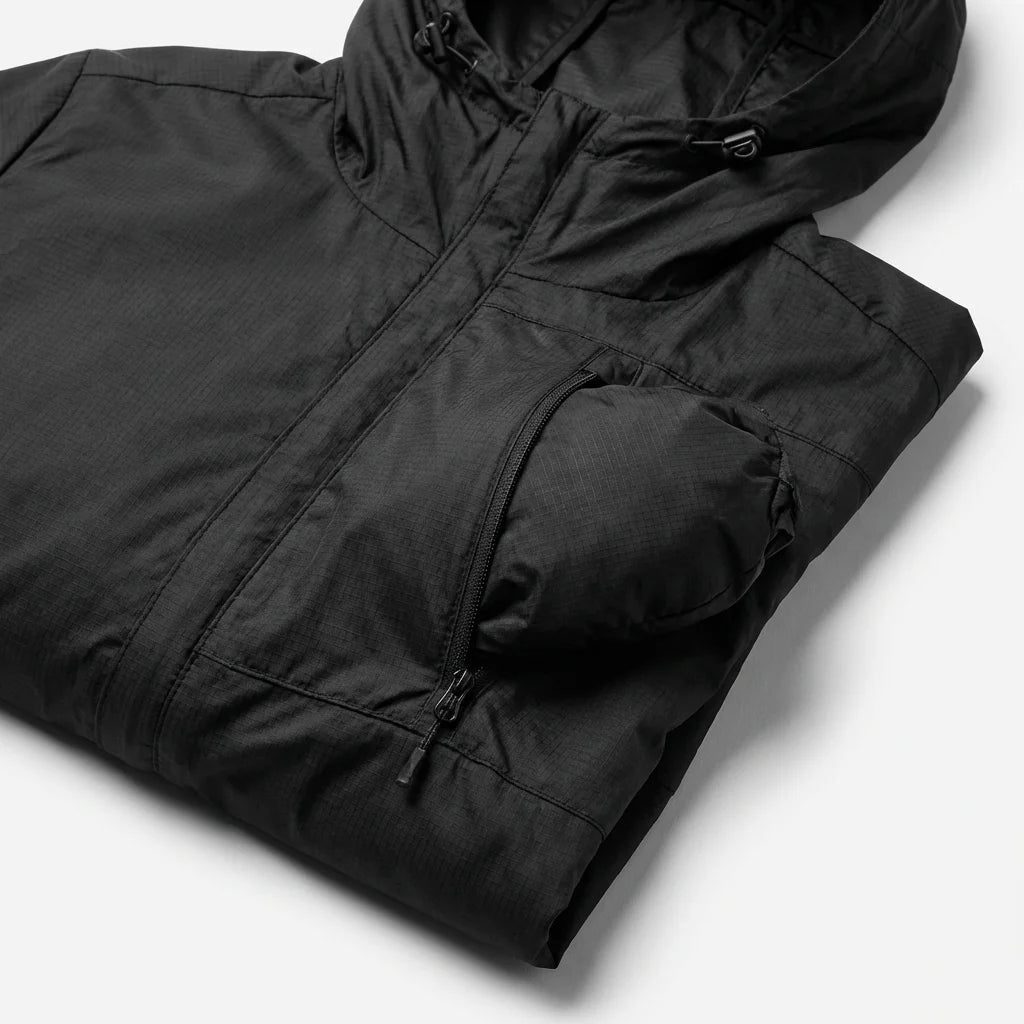 FREDD MARSHALL Norvan-Shell SL Wind Jacket packable pocket detail